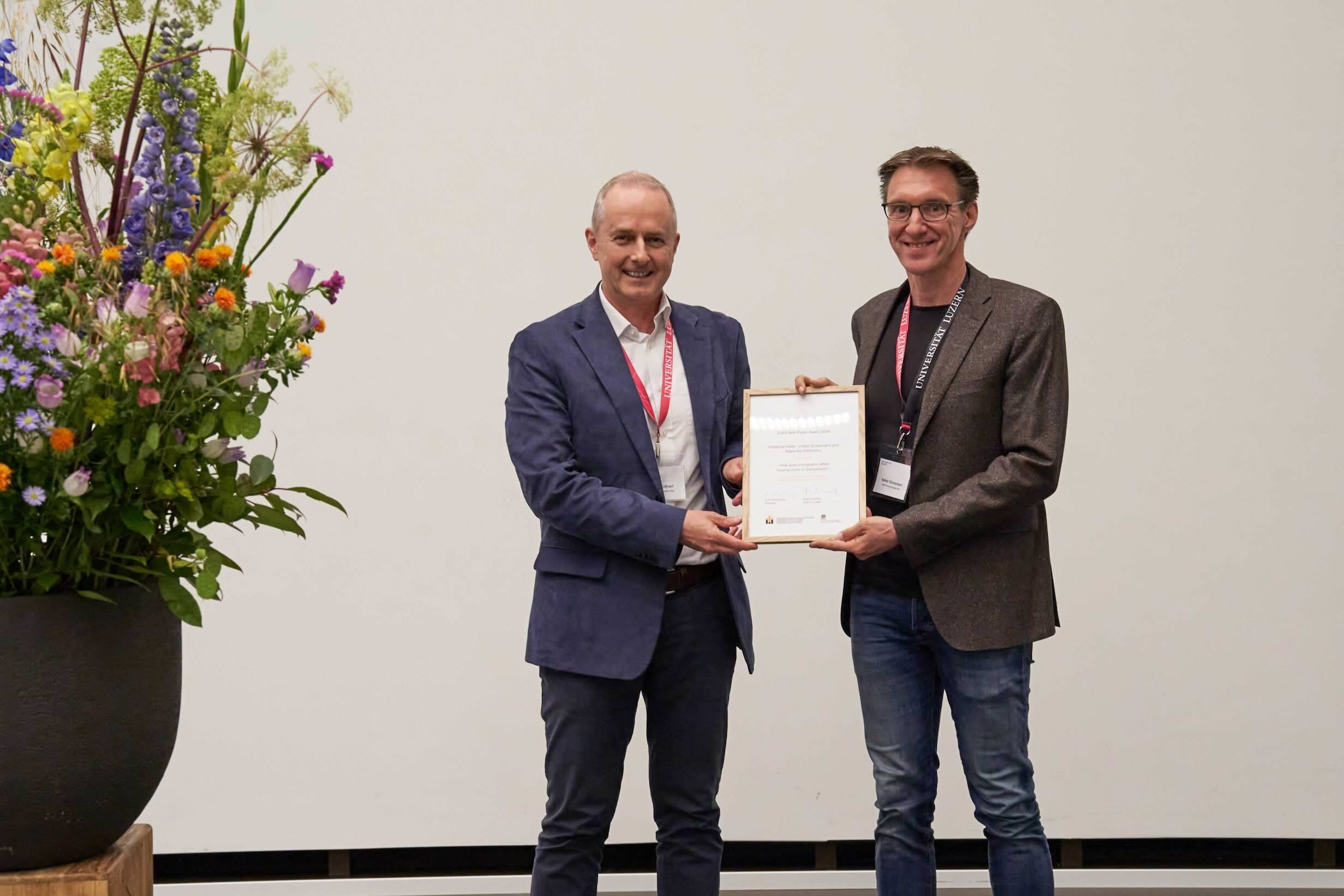 2024 SJES Best Paper Award, Marius Brülhart (editor-in-chief) and Volker Grossmann
